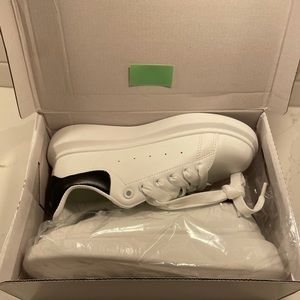 Black and white platform sneakers